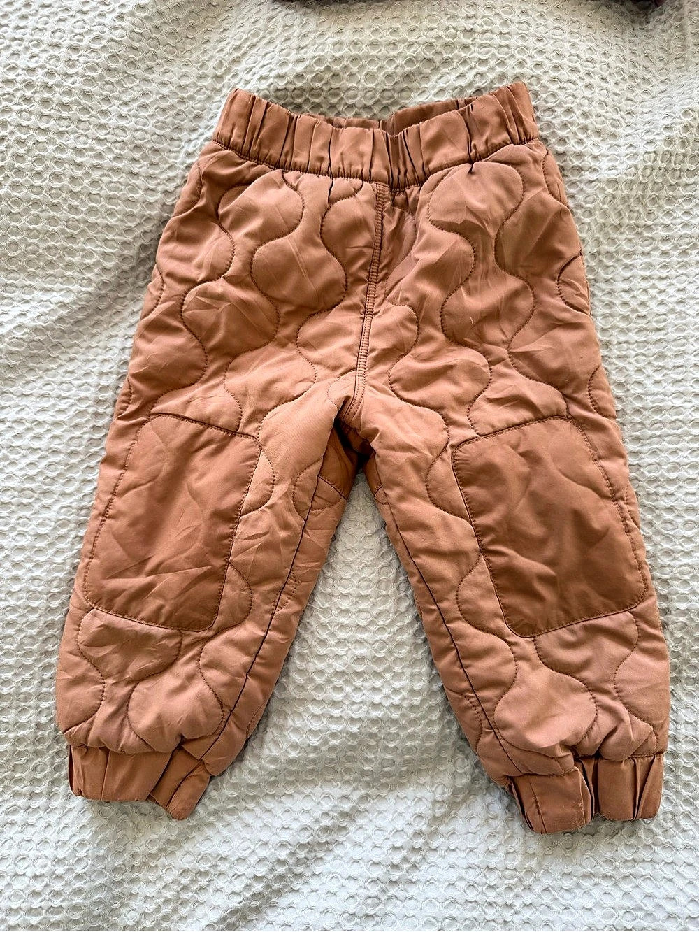 Patagonia Baby Quilted Puff Joggers in Orange